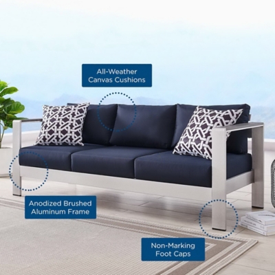 Close-up of the outdoor sofa with cushions and frame features highlighted