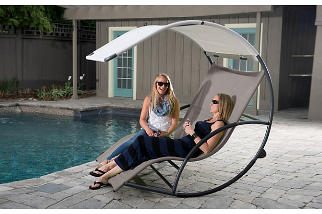 Looking for a cool, canopy escape? Sway in the breeze while keeping the sun out of your face with this state-of-the-art double chaise rocker. A lightweight powder-coated aluminum frame keeps it rust- and worry-free. Built to accommodate you and a friend as you soak in the scenery. This modern design will enhance the ambiance of your backyard for years to come.Sturdy acrylic mesh seat withstands all-weather conditions | Durable polyester canopy blocks UV rays | Lightweight powder-coated aluminum base is rust-resistant | Rubberized wraps on arms add comfort and prevent scuffs | Holds 2 adults up to 450 lbs. | Spot clean fabric with a mild detergent and water; rinse and air dry | 1-year warranty | Assembly required