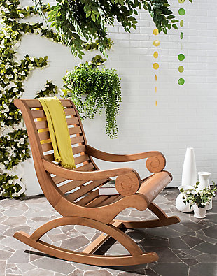 Talk about giving the porch rocker a royal makeover. Incorporating the serpentine flair of British classic furniture, the Sonora outdoor rocking chair rocks a richly elegant look in outdoor furniture. Built of sustainable acacia wood for years of satisfaction, it’s the ultimate chair for reading, rocking and relishing a sunset.Made of acacia wood | Teak brown finish | Smooth rocking motion | Slatted wood design for quick drainage | Weather resistant; recommend storing outdoor furniture indoors or cover well when not in use | Immediately clean spills with warm water and mild soap on slightly dampened sponge; let air dry | Assembly required