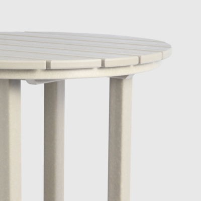 Close-up of the round slatted tabletop showing slat gaps