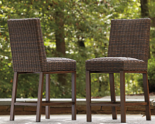 Pretty enough for trendy interiors, yet durable enough to weather the elements, the Paradise Trail outdoor bar stool rises to the challenge beautifully. Handwoven resin wicker over rust-proof aluminum merges high style with low maintenance. Rest assured, the exposed frame only looks like wood. Its sturdy aluminum construction is perfectly suited for al fresco living.Set of 2 | All-weather, handwoven resin wicker over rust-proof aluminum frame | High density foam is layered under the seats | Aluminum legs with wood-like finish | Comfortable footrest | Ships in single box | Assembly required | Estimated Assembly Time: 30 Minutes