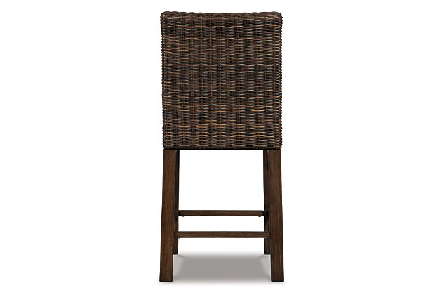 Pretty enough for trendy interiors, yet durable enough to weather the elements, the Paradise Trail outdoor bar stool rises to the challenge beautifully. Handwoven resin wicker over rust-proof aluminum merges high style with low maintenance. Rest assured, the exposed frame only looks like wood. Its sturdy aluminum construction is perfectly suited for al fresco living.Set of 2 | All-weather, handwoven resin wicker over rust-proof aluminum frame | High density foam is layered under the seats | Aluminum legs with wood-like finish | Comfortable footrest | Ships in single box | Assembly required | Estimated Assembly Time: 30 Minutes