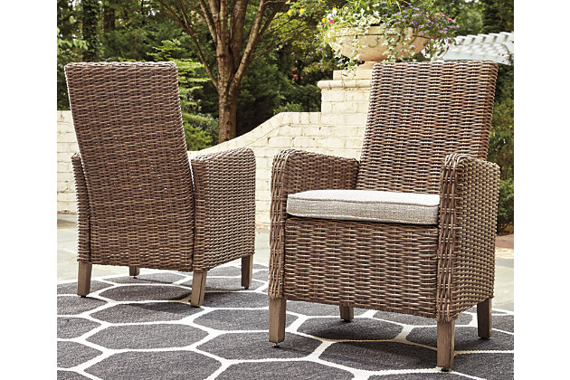 Sporting an easy-on-the-eyes look inspired by driftwood, the Beachcroft dining arm chair with cushion elevates the art of indoor-outdoor living. Beautiful and durable enough for indoor and outdoor use, this brilliantly styled dining chair entices with a plush, removable cushion wrapped in high-performing Nuvella® fabric that’s a breeze to keep clean.All-weather resin wicker handwoven over powder coated rust-resistant aluminum frame | Cushion covered in high performing solution dyed Nuvella® fabric | All-weather foam cushion core wrapped in soft polyester | Clean fabric with mild soap and water, let air dry; for stubborn stains, use a solution of 1 cup bleach to 1 gallon water | Imported fabric and fill | Assembly required | Excluded From Promotional Discounts | Estimated Assembly Time: 45 Minutes