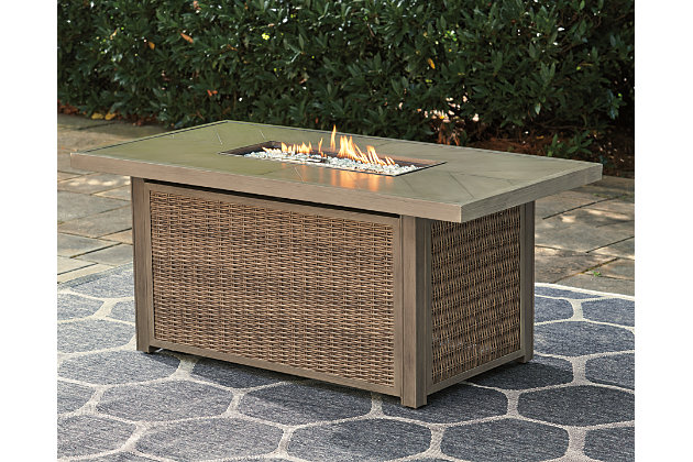 Sporting an easy-on-the-eyes look inspired by driftwood, the Beachcroft fire pit table elevates the art of alfresco living. Its chic chevron-patterned top is paired with all-weather resin wicker over rust-proof aluminum for beauty and brawn. Stainless steel burner with glass beads adds a captivating element sure to wow.Gas fire pit table with CSA-approved 30,000 BTU stainless steel burner, glass beads, burner cover and all-weather protective cover | Aluminum top | All-weather resin wicker handwoven over powder coated rust-proof aluminum frame | Battery-operated ignition system with adjustable flame control; battery included | Cabinet door conceals gas propane tank (not included) and 2 shelves | Convertible to natural gas | Assembly required | Assembly of fire pit table provided with in-home delivery; connection to propane tank or connector hose not provided | Estimated Assembly Time: 30 Minutes