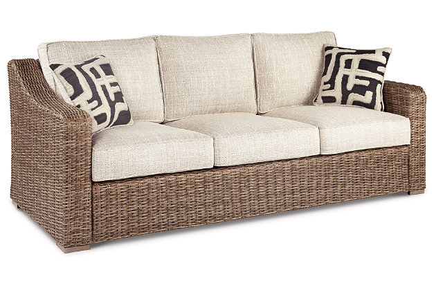 Sporting an easy-on-the-eyes look inspired by driftwood, the Beachcroft sofa elevates the art of indoor-outdoor living. Beautiful and durable enough for indoor and outdoor use, this high-style/low-maintenance sofa entices with plush, removable cushions wrapped in Nuvella® fabric that’s a breeze to keep clean.All-weather resin wicker handwoven over powder coated rust-proof aluminum frame | 2 throw pillows included | Zippered cushions and throw pillows covered in high-performing Nuvella® fabric | All-weather foam cushion core wrapped in soft polyester | Clean fabric with mild soap and water, let air dry; for stubborn stains, use a solution of 1 cup bleach to 1 gallon water | Imported fabric and fill | Assembly required | Estimated Assembly Time: 30 Minutes