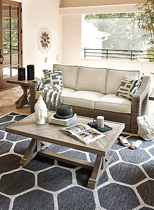 Sporting an easy-on-the-eyes look inspired by driftwood, the Beachcroft sofa elevates the art of indoor-outdoor living. Beautiful and durable enough for indoor and outdoor use, this high-style/low-maintenance sofa entices with plush, removable cushions wrapped in Nuvella® fabric that’s a breeze to keep clean.All-weather resin wicker handwoven over powder coated rust-proof aluminum frame | 2 throw pillows included | Zippered cushions and throw pillows covered in high-performing Nuvella® fabric | All-weather foam cushion core wrapped in soft polyester | Clean fabric with mild soap and water, let air dry; for stubborn stains, use a solution of 1 cup bleach to 1 gallon water | Imported fabric and fill | Assembly required | Estimated Assembly Time: 30 Minutes