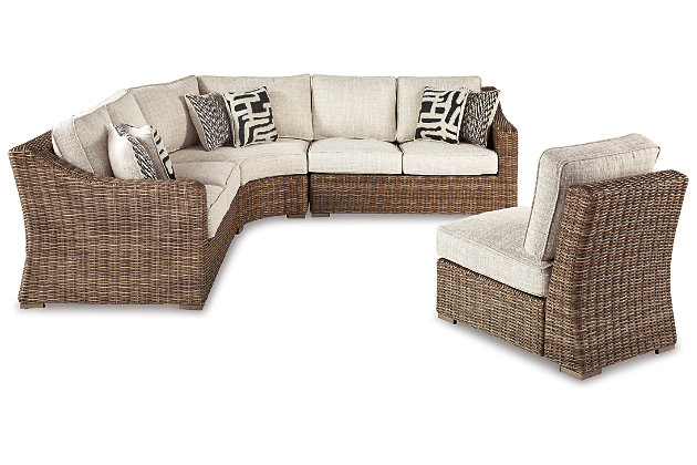 Sporting an easy-on-the-eyes look inspired by driftwood, the Beachcroft sectional elevates the art of indoor-outdoor living. Beautiful and durable enough for indoor and outdoor use, this high-style/low-maintenance set entices with plush, removable cushions wrapped in Nuvella® fabric that’s a breeze to keep clean.Includes armless chair with cushion, curved corner chair with cushion and left-arm/right-arm facing loveseat | "Left-arm" and "right-arm" describe the position of the arm when you face the piece | All-weather resin wicker handwoven over powder coated rust-proof aluminum frames | Cushions and pillows covered in high-performing Nuvella® fabric | All-weather foam cushion core wrapped in soft polyester | Clean fabric with mild soap and water, let air dry; for stubborn stains, use a solution of 1 cup bleach to 1 gallon water | Imported fabric and fill | Assembly required | Estimated Assembly Time: 70 Minutes