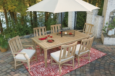 Clare View Outdoor Dining Table With Umbrella Option Ashley Furniture Homestore