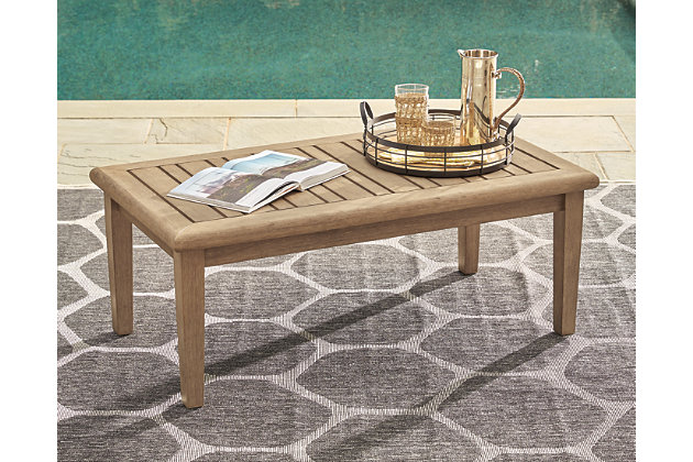 Discover a high style alternative to traditional outdoor furniture. With its antiqued teak-like finish, the Gerianne coffee table definitely has the corner on style. Better yet, it has the edge when it comes to affordability. For that much more weather protection, the table's eucalyptus wood frame with slat styling is treated to a 5-step finishing process.Made of eucalyptus wood | Grayish brown finish | Slatted top sheds rainwater | Assembly required | Estimated Assembly Time: 15 Minutes