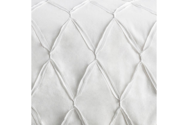 A delight in white—this Euro sham proves that minimal color and loads of texture are all you need to transform your bedroom. Hint of metallic sheen adds a luxe touch you’re sure to love.Pillow sold separately | Made of cotton/linen | Imported | Machine washable