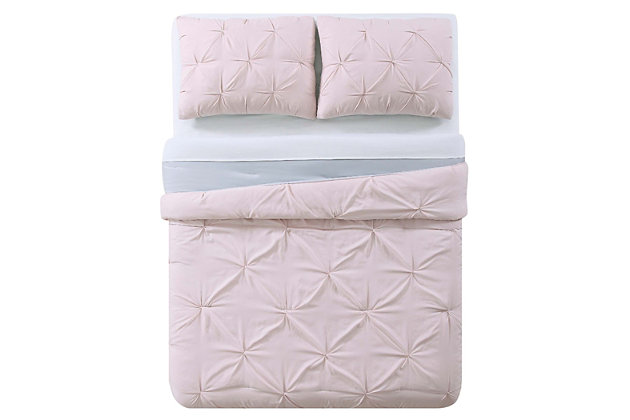 Make a solid choice for your room with this adorable bedding set. Pinch pleats add a layer of sophistication set against a pretty pastel background. Lighthearted and vibrant, this bed set creates a sweet retreat with an easygoing air.Includes comforter and sham | Made of microfiber polyester | Polyfill | Imported | Machine washable