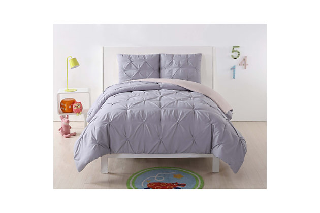Make a solid choice for your room with this adorable bedding set. Pinch pleats add a layer of sophistication set against a pretty pastel background. Lighthearted and vibrant, this bed set creates a sweet retreat with an easygoing air.Includes comforter and sham | Made of microfiber polyester | Polyfill | Imported | Machine washable