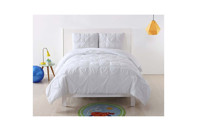 Make a solid choice for your room with this adorable bedding set. Pinch pleats add a layer of sophistication against a crisp, white background. Lighthearted and vibrant, this bed set creates a sweet retreat with an easygoing air.Includes comforter and sham | Made of microfiber polyester | Polyfill | Imported | Machine washable