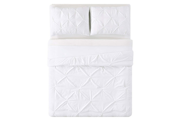 Make a solid choice for your room with this adorable bedding set. Pinch pleats add a layer of sophistication against a crisp, white background. Lighthearted and vibrant, this bed set creates a sweet retreat with an easygoing air.Includes comforter and sham | Made of microfiber polyester | Polyfill | Imported | Machine washable