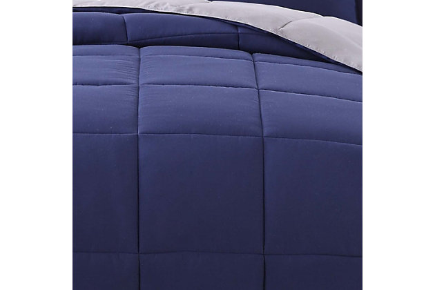 Get a solid start on your home decor with this classic reversible bedding set. An all-over color allows you to create your look again and again without major expense. Box quilting prevents the fill from shifting and bunching while adding a subtle geometric flair.Includes comforter and sham | Made of brushed microfiber polyester | Polyfill | Imported | Machine washable