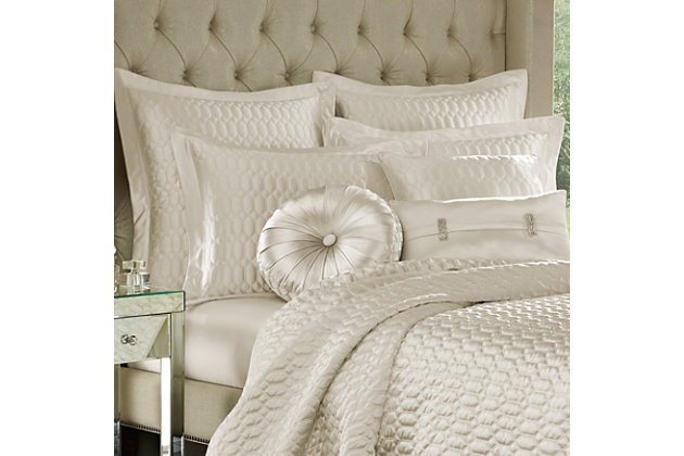 Add some luxury to your bedroom with this glamorous quilted coverlet. Made of highly constructed satin, this piece brings elegance to any bedroom.Made of 100% polyester | Plush polyfill | 1 full/queen coverlet | Dry clean only | Imported