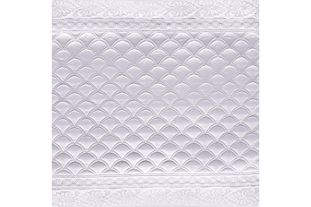Add some luxury to your bedroom with this updated quilted coverlet. A matte satin captures the light in any bedroom. Detailed with an elegant foulard and damask embroidery, this piece elevates your space to something special.Made of 100% polyester | Plush polyfill | 1 king coverlet | Dry clean only | Imported