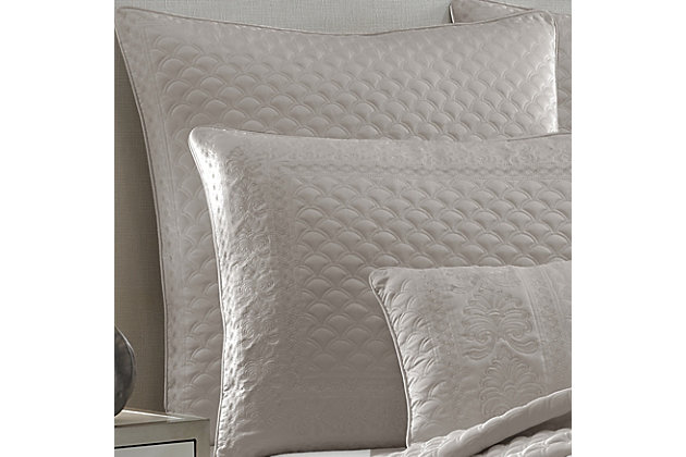 Add some luxury to your bedroom with this updated Euro sham. A matte satin captures the light in any bedroom. Detailed with an elegant foulard and damask embroidery, this piece elevates your space to something special.Made of 100% polyester | Plush polyfill | 1 euro sham | Zipper closure | Dry clean only | Imported