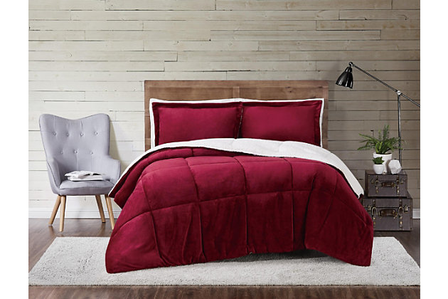 Indulge in a splash of color and loads of cozy comfort with this full/queen comforter set. Velvet face with square quilting reverses to a feel-good sherpa fabric in white for twice the softness.Set includes comforter and 2 shams | Polyester cover and fill | Velvet quilted front; sherpa back in white | Imported | Machine washable