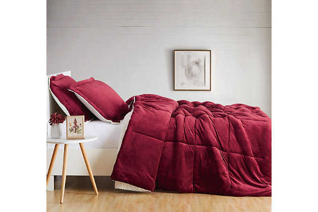 Indulge in a splash of color and loads of cozy comfort with this full/queen comforter set. Velvet face with square quilting reverses to a feel-good sherpa fabric in white for twice the softness.Set includes comforter and 2 shams | Polyester cover and fill | Velvet quilted front; sherpa back in white | Imported | Machine washable
