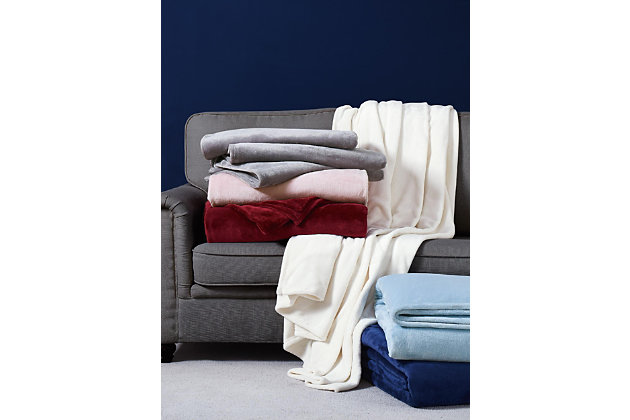 Wonderfully plush to the touch, this sumptuous twin XL throw/blanket is a dream come true. An essential for a beautifully layered bed, it’s got a velvet feel with so much appeal.Made of polyester | Velvet face | Imported | Machine washable