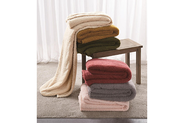 Talk about a big softy. Made of the finest microfibers for unrivaled softness and comfort, this king throw/blanket truly has you covered. Rest assured, its velvety feel is the stuff dreams are made of.Made of polyester | 280 gsm (grams per square meter) velvet fabric | Imported | Machine washable