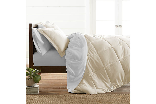 Not too heavy and not too light, this down-alternative comforter by ienjoy Home® is just right. Featuring a superior loft and down-like feel to keep you cozy all year round, this luxury comforter features end-to-end baffle-box construction to prevent fiber from shifting, eliminating the need for regular fluffing. Rest assured, this quality comforter is 100% hypoallergenic, too.Made of microfiber | Lightweight shell for exceptional softness and drape | Evenly filled for superior warmth | Oversized dimensions; perfect for extra-deep mattresses | Generous baffle box stitching for optimum loft | Machine washable | Imported
