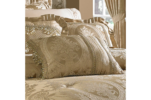 The unique boudoir pillow incorporates all the ensemble. The framed floral is perfectly centered with the delicate border on one side and finished with the custom braided gimp. Adding a glamorous touch of jewelry, the pillow has the elegant crystal beaded trim on both ends. The reverse is the diamond trellis fabric.100% polyester | Gold | Elegant accent pillow for your bedding, sofa, or armchair | Made with design house quality fabric and craftsmanship | Timeless take on traditional patterns with an updated color palette | Dry clean only | Imported | Polyester fill