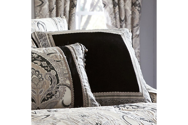 The 18" X 18" pillow offers a perfectly centered medallion embroidery that matches back to the comforter. 
The pillow is framed with a 1/4" piping in the black velvet.
The reverse of the decorative pillow is a solid black velvet with a hidden zipper closure.100% polyester | Silver | Elegant accent pillow for your bedding, sofa, or armchair | Made with design house quality fabric and craftsmanship | Timeless take on traditional patterns with an updated color palette | Dry clean only | Imported | Polyester fill