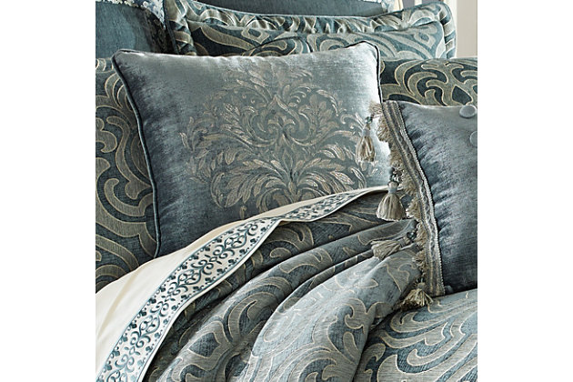 The 20" X 20" pillow has an embroidered motif centered on the pillow. It coordinates back to the damask on the comforter. The pillow is finished with a ¼’ solid teal piping and reverses to the solid chenille.100% polyester | Blue | Elegant accent pillow for your bedding, sofa, or armchair | Made with design house quality fabric and craftsmanship | Timeless take on traditional patterns with an updated color palette | Dry clean only | Imported | Polyester fill