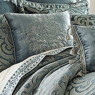 The 20" X 20" pillow has an embroidered motif centered on the pillow. It coordinates back to the damask on the comforter. The pillow is finished with a ¼’ solid teal piping and reverses to the solid chenille.100% polyester | Blue | Elegant accent pillow for your bedding, sofa, or armchair | Made with design house quality fabric and craftsmanship | Timeless take on traditional patterns with an updated color palette | Dry clean only | Imported | Polyester fill