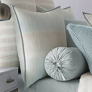Update your bedroom with the uniquely modern style of Oscar Oliver Vince Comforter Set. This beautiful print features layered shades of aqua and neutrals to create soft sandy texture balanced by white stripes, and designed with thoughtful pattern placement to create an effortlessly soothing atmosphere in your bedroom. The oversized and overfilled comforter is completely reversible, with ultra-soft 100% brushed cotton on both sides.
The 4 pcs set includes : One luxury cotton printed comforter. Two softly padded, perfectly matched pillow shams with a beautiful stripe section centered perfectly and fine aqua binding and a conveniently hidden zipper. One tailored brushed cotton bed skirt in solid aqua, with split corners and a 15" drop.100% cotton | Blue | Comforter set includes: 1 comforter, 2 pillow shams, 1 bed skirt | Made with design house quality fabric and craftsmanship | Timeless take on traditional patterns with an updated color palette | Dry clean only | Imported | Polyester fill