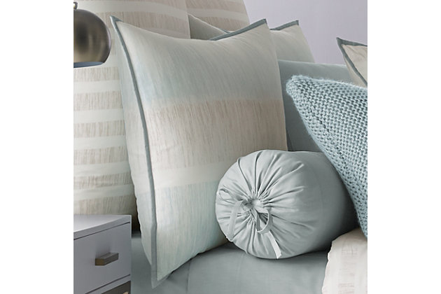Update your bedroom with the uniquely modern style of Oscar Oliver Vince Comforter Set. This beautiful print features layered shades of aqua and neutrals to create soft sandy texture balanced by white stripes, and designed with thoughtful pattern placement to create an effortlessly soothing atmosphere in your bedroom. The oversized and overfilled comforter is completely reversible, with ultra-soft 100% brushed cotton on both sides.
The 4 pcs set includes : One luxury cotton printed comforter. Two softly padded, perfectly matched pillow shams with a beautiful stripe section centered perfectly and fine aqua binding and a conveniently hidden zipper. One tailored brushed cotton bed skirt in solid aqua, with split corners and a 15" drop.100% cotton | Blue | Comforter set includes: 1 comforter, 2 pillow shams, 1 bed skirt | Made with design house quality fabric and craftsmanship | Timeless take on traditional patterns with an updated color palette | Dry clean only | Imported | Polyester fill