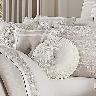 The tufted round pillow uses white colored faux linen to create a one of a kind accent to this bedding ensemble. These unique pillows are sewn by hand and are finished with a fabric-covered button on both sides.100% polyester | White | Elegant accent pillow for your bedding, sofa, or armchair | Made with design house quality fabric and craftsmanship | Timeless take on traditional patterns with an updated color palette | Dry clean only | Imported | Polyester fill