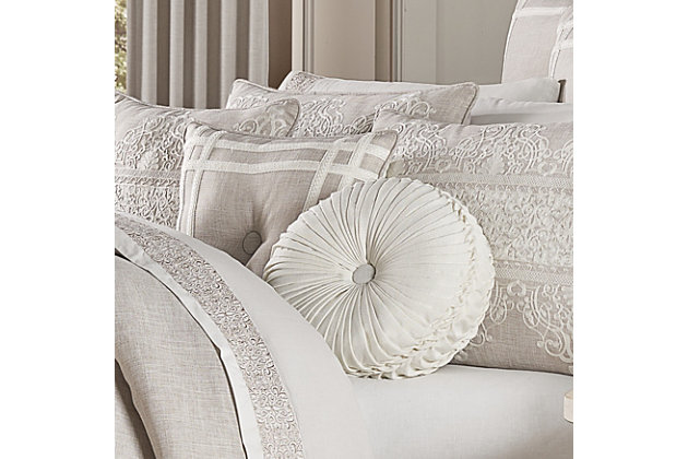 The tufted round pillow uses white colored faux linen to create a one of a kind accent to this bedding ensemble. These unique pillows are sewn by hand and are finished with a fabric-covered button on both sides.100% polyester | White | Elegant accent pillow for your bedding, sofa, or armchair | Made with design house quality fabric and craftsmanship | Timeless take on traditional patterns with an updated color palette | Dry clean only | Imported | Polyester fill
