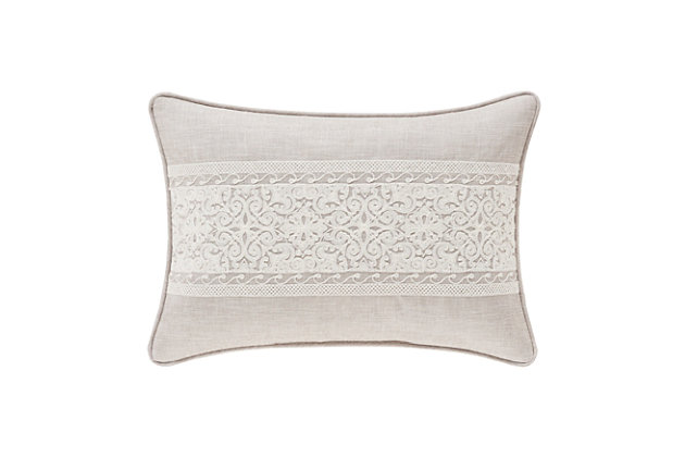The boudoir pillow has an intricately detailed embroidered design running horizontal centered on the face. The face and reverse are a beige colored faux linen. The pillow is finished with 1/4" beige colored piping.100% polyester | Beige | Elegant accent pillow for your bedding, sofa, or armchair | Made with design house quality fabric and craftsmanship | Timeless take on traditional patterns with an updated color palette | Dry clean only | Imported | Polyester fill