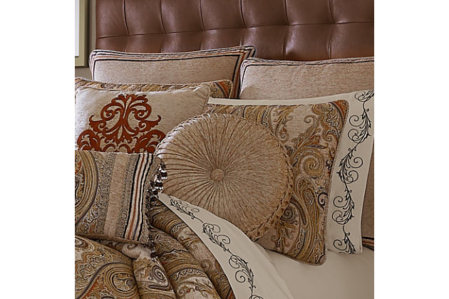 The Luciana Beige Tufted Round Pillow used a beautiful beige chenille fabric to create a one of a kind accent to this bedding ensemble. This unique pillow is sewn by hand and is finished with a fabric covered button on both sides.100% polyester | Beige | Elegant accent pillow for your bedding, sofa, or armchair | Made with design house quality fabric and craftsmanship | Timeless take on traditional patterns with an updated color palette | Dry clean only | Imported | Polyester fill