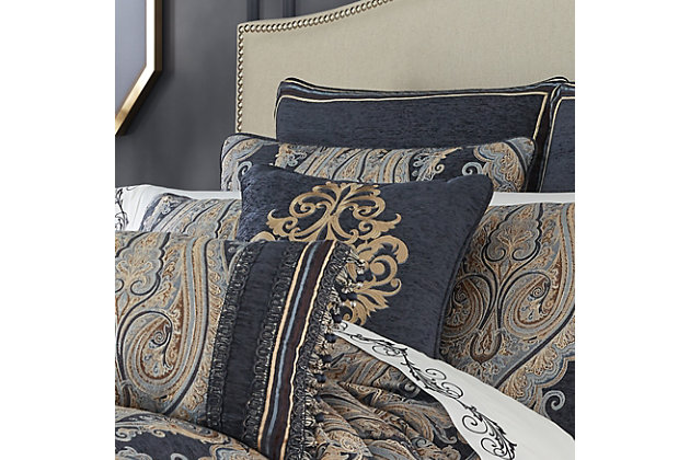 The Luciana Indigo 18" Decorative Pillow is beautifully embroidered with a luxurious gold and pale blue colored damask on an indigo base cloth. This square pillow brings richness to your traditional bedding set by adding dimension and color. Pair this pillow with the Luciana Indigo bedding set by J. Queen New York for a complete look.100% polyester | Blue | Elegant accent pillow for your bedding, sofa, or armchair | Made with design house quality fabric and craftsmanship | Timeless take on traditional patterns with an updated color palette | Dry clean only | Imported | Polyester fill