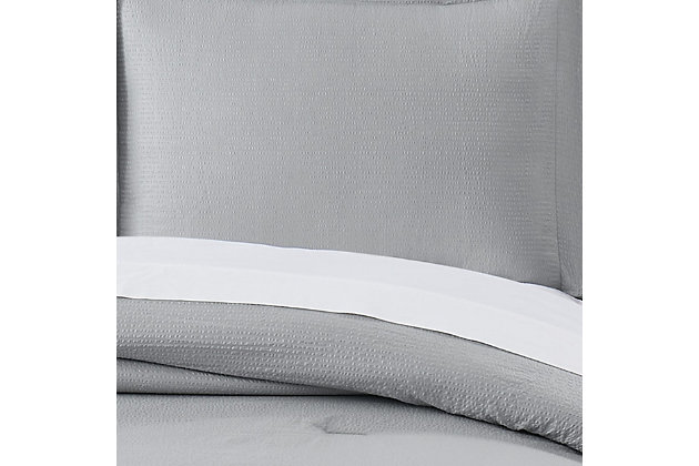 Have a Truly Calm sleep with this certified antimicrobial and anti-odor control solid color Bed in a Bag with comforter and sheet set. The HeiQ technology combines scientific research with sleep enhancements for the simple purpose of improving the quality of sleep, which is essential to help maintain your optimal health and well-being. The bedding is beautified with a seersucker patterned face for enhanced texture and filled with a 100% down alternative polyester for a dreamy bedroom refresh.Made of 100% microfiber with heiq pure antimicrobial treatment with 100% polyester fill; face cloth uses a heat set seersucker texture | Imported | Machine washable; must be washed in appropriate size equipment to avoid damage | Includes: one comforter 90x90 inches, two standard shams 20x26 inches, one fitted sheet 54x75 inches with 15 inch pocket to fit up to a 18 inch deep mattress, one flat sheet 90x93 inches, and two pillowcases 20x30 inches