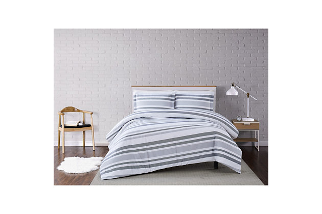 Casual and contemporary. This designer duvet set is dressed to impress with gray stripes contrasting subtly against a clean, white background. Truly Soft microfiber material is indulgent to the touch and a breeze to clean. Includes a duvet cover and sham; insert not included.Made of 100% brushed microfiber with truly soft treatment | Imported | Machine washable; must be washed in appropriate size equipment to avoid damage | Includes: one twin xl duvet cover 68x90 inches with button closure and one standard sham 20x26 inches; insert must be purchased separately