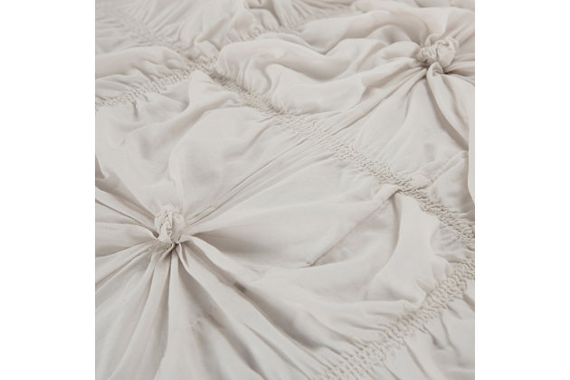 With its draped, dramatic cotton voile face, this dreamy comforter set adds instance romance to your bedroom retreat. Rest assured, it’s machine washable for easy-breezy, everyday luxury.100% cotton voile face  | Rouching | Machine wash cold, gentle cycle, tumble dry low, do not bleach | Imported | Polyester fill | 1 comforter and 1 sham