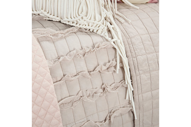 
Go easy on color and big on frills with this simply chic quilt with cotton face. Frilly and fun raised textural stripes turn a solid neutral tone into something truly sensational. 100% cotton face  | Quilted with multilayered frills applied by hand-guided machines  | Machine wash cold, gentle cycle, tumble dry low, do not bleach | Imported | Polyester fill | Shams not included