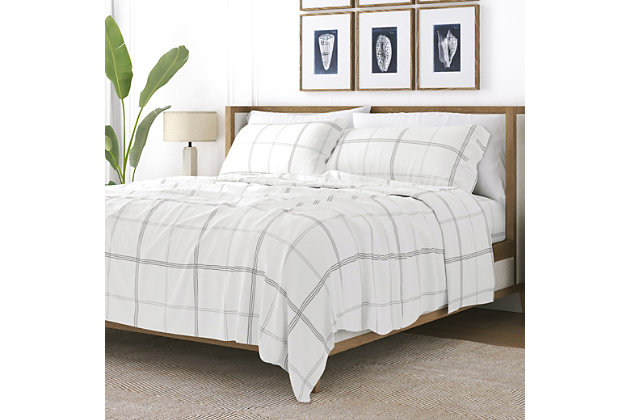 You are sure to enjoy your coziest night's sleep with our Ultra Soft Checkered Pattern Flannel Sheet Set by ienjoy Home. Crafted from the most plush cotton-rich blend, you will never want to get out of these super soft and warm sheets.Twin size set includes: 1 fitted sheet: 39" w x 75" l +14" , 1 flat sheet: 66" w x 96" l , 1 standard pillowcase: 20" w x 30" l | Made of ultra-soft 100% cotton | Printed checkered pattern for a classic addition to any bedroom decor | 14" deep pocket fitted sheets -accomandates a mattress up to 18" deep | Easy care: machine wash cold, tumble dry low, do not bleach, iron, or use fabric softener. Fade and wrinkle resistant | Imported
