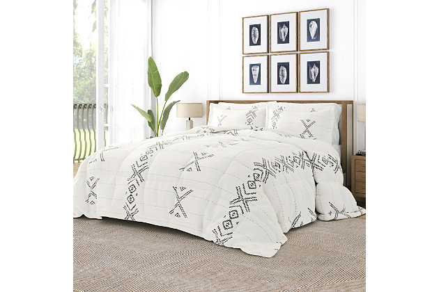 The perfect comforter to keep you cozy all year round.  The Down Alternative Urban Stitch Patterned comforter set from the Home Collection features the perfect loft and Down-like feel to keep you warm and toasty while you sleep. Designed for healthy living and 100% hypoallergenic for allergy sufferers, this luxury comforter presents a quality alternative to Down with incredible loft and end to end baffle-box construction, preventing fiber from shifting, eliminating the need for regular fluffing.Twin Size Set Includes: 1 Comforter: 70" x 90", 1 Standard Sham: 20" x 26" (2" flange) | Light-weight shell for exceptional softness and drape | Generous baffle box stitching for optimum loft | Printed Urban Stitch pattern for a classic addition to any bedroom decor | Evenly filled for superior warmth | Imported