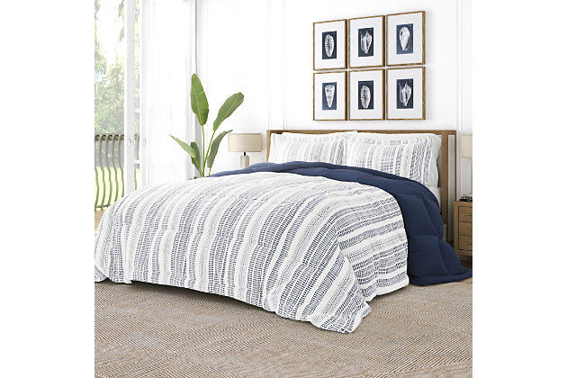 The perfect comforter to keep you cozy all year round. The Down Alternative Farmhouse Dreams Patterned reversible comforter set from the Home Collection features the perfect loft and Down-like feel to keep you warm and toasty while you sleep. Designed for healthy living and 100% hypoallergenic for allergy sufferers, this luxury comforter presents a quality alternative to Down with incredible loft and end to end baffle-box construction, preventing fiber from shifting, eliminating the need for regular fluffing.Twin Size Set Includes: 1 Comforter: 70" x 90", 1 Standard Sham: 20" x 26" (2" flange) | Light-weight shell for exceptional softness and drape | Generous baffle box stitching for optimum loft | Printed Farmhouse Dreams pattern reverse to Navy | Evenly filled for superior warmth | Imported