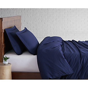 Fresh, cool and lightweight, just like your favorite button-down shirt. Tight-weave cotton makes this solid duvet cover and coordinating shams more breathable to ensure a good night's rest, especially for hot sleepers. This contemporary collection gets softer with every wash while also giving you that crisp hotel look, particularly when ironed.Made of 100% cotton | Imported | Set includes duvet cover and 2 pillow shams; insert not included | Button closure on duvet cover | Machine washable; use appropriately sized washer to avoid excess wear | Machine wash cold on gentle cycle, no bleach; tumble dry