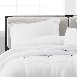 This collection is solid in so many ways. Crafted of supremely soft microfiber, the contemporary comforter and matching shams feature quality construction and pure style. They're the perfect coordinates to showcase in your home.Made of 100% microfiber | Polyfill | Imported | Set includes comforter and 2 pillow shams | Envelope closure on reverse of sham | Machine wash in appropriately sized equipment to avoid damage