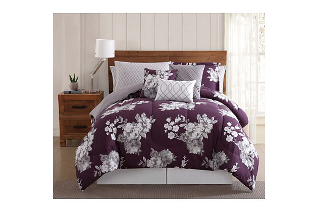 All your bedding needs in one chic, time-saving package. This ensemble features a pretty etched floral pattern on a purple background. The accent print is a lovely lattice pattern in white and gray. Added accessories let you create two looks to suit your mood and switch up your decor. The Bed in a Bag contains a comforter, two sheet sets (a flat sheet, fitted sheet and two pillowcases each), plus two pillow shams and two decorative pillows. Made with polyester for easy care.Made of 100% polyester | Imported | Set includes comforter, 2 pillow shams, 2 decorative pillows, 2 fitted and 2 flat sheets and 4 pillowcases | Sheets are machine washable for easy care | Comforter and shams are machine washable in appropriately sized machine to avoid damage | Spot cleaning suggested for decorative pillows