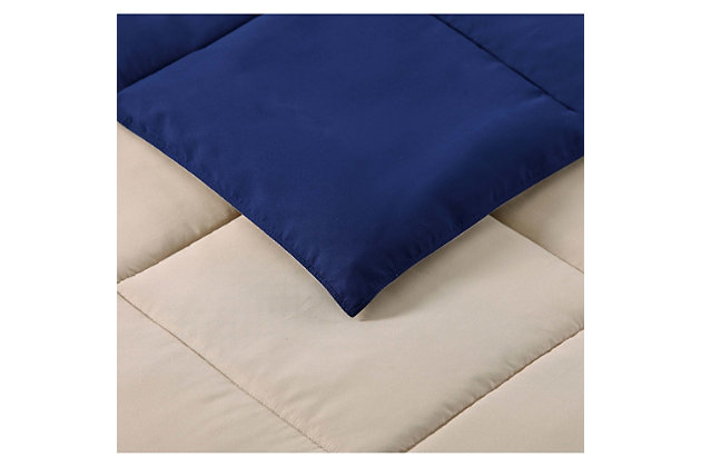 Revolutionary softness is what you get with this collection. The reversible solid-colored comforter lets you change the vibe in your room simply by flipping it over. Two coordinating shams complete the look. Made with a hypoallergenic, feel-good microfiber for softness and easy care.Made of 100% hypoallergenic microfiber polyester | Imported | Set includes reversible comforter and 2 pillow shams | Machine wash in appropriately sized equipment to avoid damage | Comforter and shams are machine washable in appropriately sized equipment | Spot cleaning suggested for decorative pillows