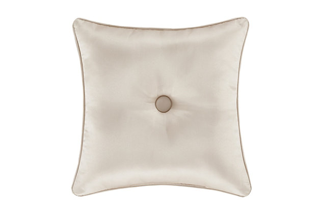 The Trinity Mitered 18” Decorative Throw Pillow is truly unique and sophisticated with a 3 inch woven jacquard border crafted along the edge of pillow. This statement accent pillow features a solid champagne satin fabric with a deeply tufted button detail on both sides. The pillow is overstuffed and finished with a 1/4" champagne piping for added detail for an elegant addition to your bedroom decor. Pair this pillow with the Trinity bedding set by J. Queen New York for a complete look.Elegant accent pillow for your bedding, sofa, or armchair. | Made with design house quality fabric and craftsmanship. | Timeless take on traditional patterns with an updated color palette. | Pair this with the Trinity bedding collection by J. Queen for a complete look.